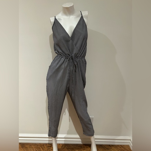 One piece jumpsuit. Black and white pinstrip.  Adjustable straps. - Picture 1 of 4